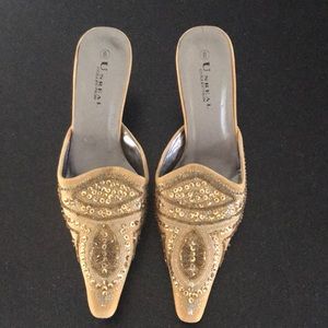 Beautifully beaded gold mules